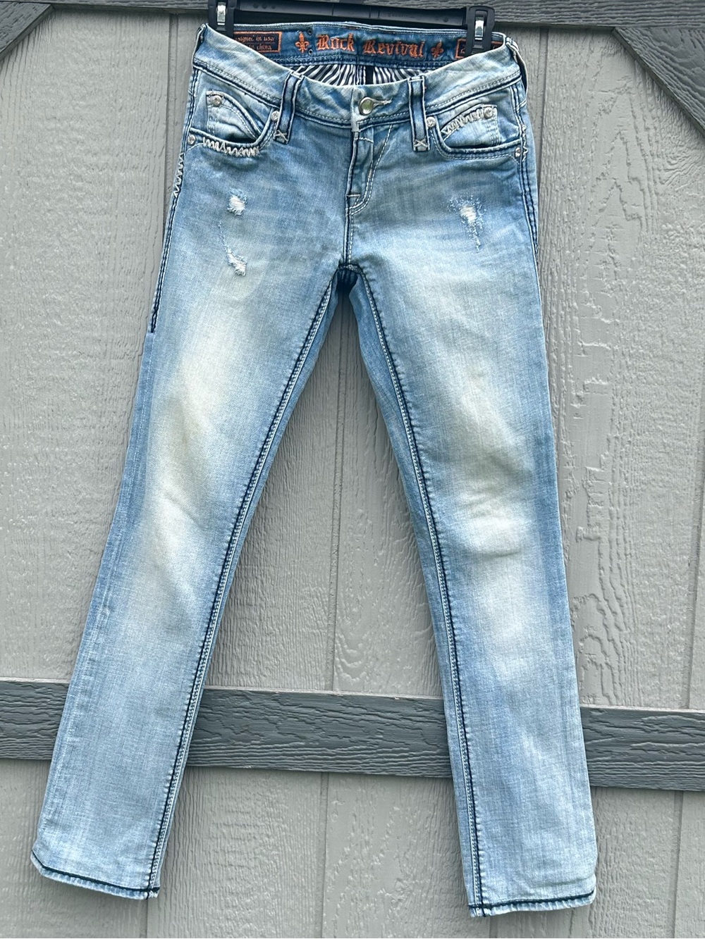 Rock Revival Charlotte Light Wash Distressed Low Rise Slim Straight Jeans